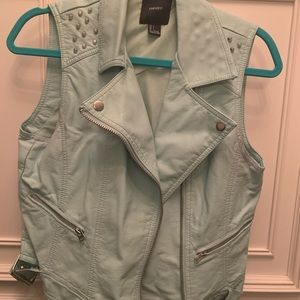 Light blue leather vest with studs